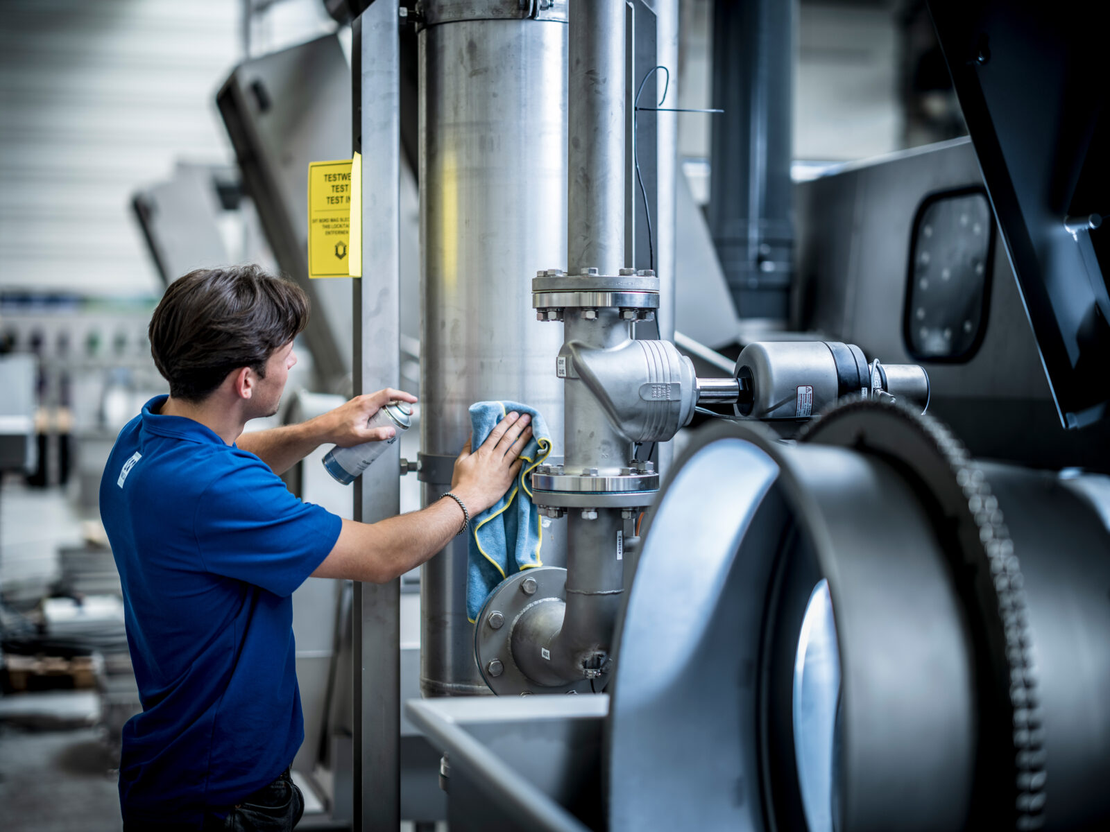 Numafa Employee working on machine